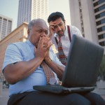 Two men, shocked by friend's social media etiquette